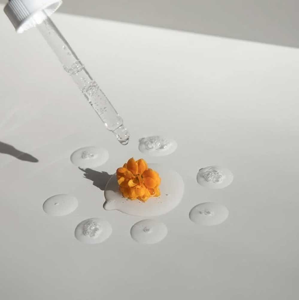 droplets of oil with flower